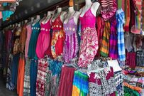 Thrift clothes on display [Image Credit: Freepik]