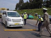 Police officers and NTSA officers in a road block