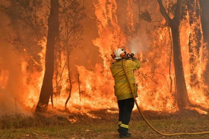Australia's band of doctors, farmers and factory workers who -- at 70,000-strong -- are the world's largest volunteer fire service