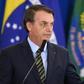 Brazilian President Jair Bolsonaro, pictured giving a speech in Brasilia on December 9, 2019, says God is Brazilian