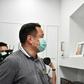 Health Minister Anutin Charnvirakul views closed circuit video images at Bamrasnaradura Infectious Disease Institute in Nonthaburi outside Bangkok where patients infected with the SARS-like virus are confined
