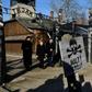 Angela Merkel was accompanied by Polish Prime Minister Mateusz Morawiecki (R) as she walked through the gates at Auschwitz