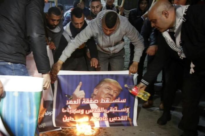 Palestinians oppose US President Donald Trump's Middle East peace plan, at a gathering in the Deheisheh refugee camp near the West Bank city of Bethlehem