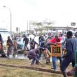 File image of a crowd at the scene of an accident where a beer truck overturned on 05 October 2019