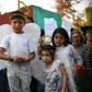 Children attend the burial in Mexico City of the  seven-year-old girl whose body was found over the weekend with signs of torture on February 18, 2020
