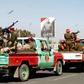 Members of the Yemeni Iran-backed Huthi rebels military police parade in the streets of the capital Sanaa on January 8, 2020