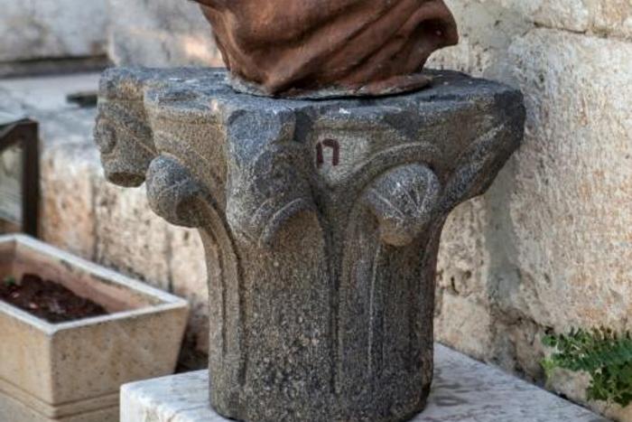 A picture taken on June 13, 2013 shows a beheaded statue of Abu al-Alaa al-Maari, a famous blind Arab philisopher and poet, displayed at the Maaret al-Numan museum