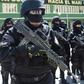 Members of Bolivia's GAT anti-terrorist unit stand guard as they are presented in La Paz, on December 3