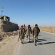 Afghan troops patrol in Helmand province. Deadly violence continues to grip Afghanistan even as the US and the Taliban negotiate on-off talks aimed at reducing America's military footprint