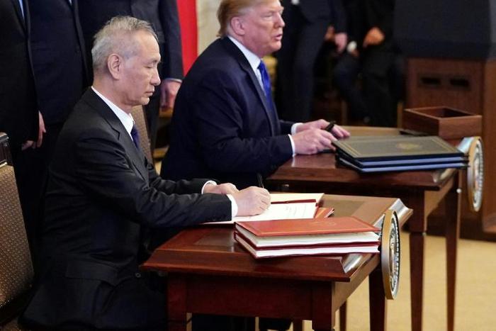Chinese Vice Premier Liu He signed the trade pact with Donald Trump at the White House, providing some much-needed relief to global markets as tensions between the economic superpowers ease for now