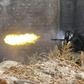 A fighter loyal to Libyan Government of National Accord (GNA)opens fire in clashes with forces loyal to strongman Khalifa Haftar in suburban Tripoli