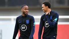 Friends turned foes: England teammates Raheem Sterling (left) and Trent Alexander-Arnold (right) will face off on Sunday