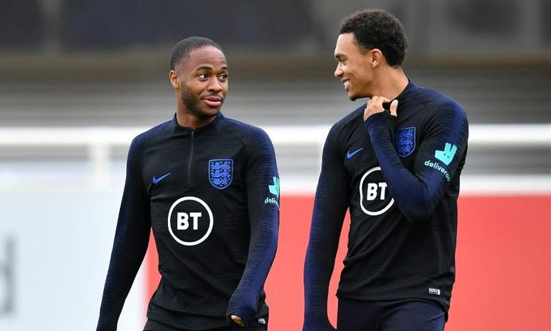 Friends turned foes: England teammates Raheem Sterling (left) and Trent Alexander-Arnold (right) will face off on Sunday