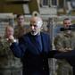 President Donald Trump made a surprise visit to Bagram on November 28 where he met with Afghan President Ashraf Ghani (R)