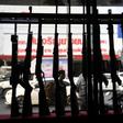 Guns are set up in a window display, located near the Terminal 21 shopping mall where a mass shooting took place in the northeastern Thai city of Nakhon Ratchasima