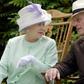 Britain's Queen Elizabeth II and Prince Philip, who is undergoing hospital treatment for what Buckingham Palace described as a "pre-existing condition"