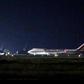A plane carrying American passengers, who were released from the Diamond Princess cruise ship in Japan, arrives at Travis Air Force Base in California on February 16
