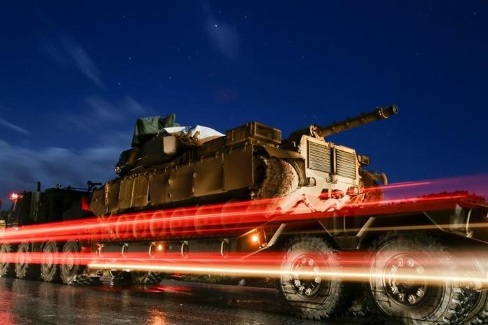 Turkey has deployed 350 vehicles with commandos backed by armoured vehicles to reinforce observation outposts in the Syrian opposition bastion of Idlib