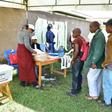 Residents queue to vote at a polling station during the local elections in the town of Arusha, north Tanzania, on November 24, 2019