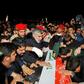 People chanted "death to America" as they carried the casket of Iranian commander Qasem Soleimani upon arrival at Ahvaz International Airport in Tehran