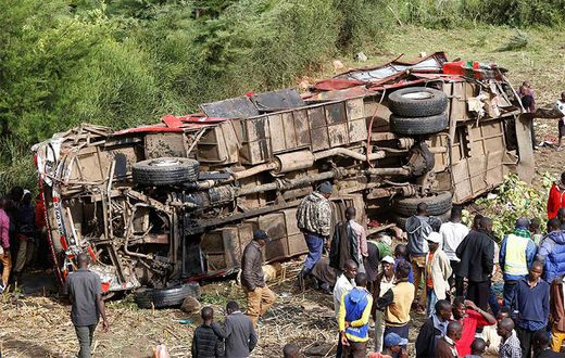 Bus rolls off a bridge