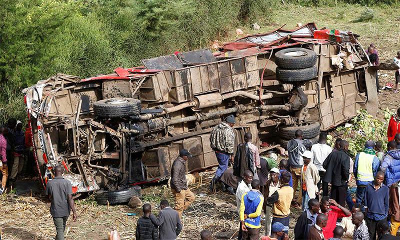 Bus rolls off a bridge