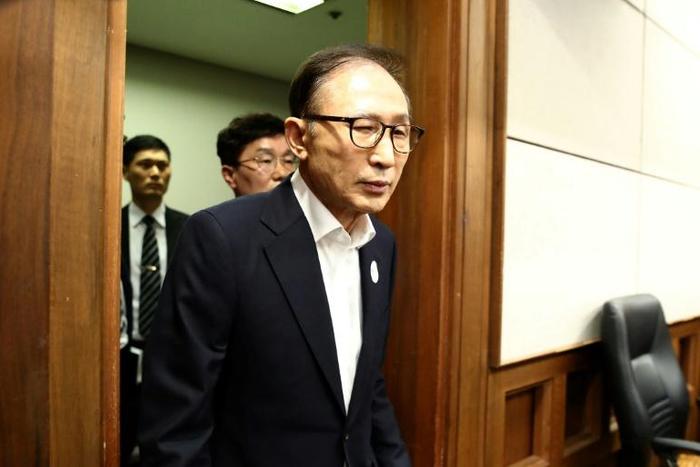 The spy chief's efforts had been in favour of then South Korean president Lee Myung-Bak (pictured at his trial in 2018)