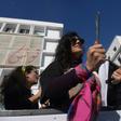 A member of the Tunisian "EnaZeda", (Me too) movement bangs a pot at a rally against sexual harassment in Tunis on November 30, 2019