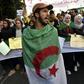 Algerian students and other protesters take part in an anti-government demonstration in the capital Algiers, on February 18