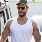 Liam Hemsworth's Biceps Could Rival Thor's Muscles