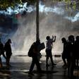 Police used water cannon and tear gas to disperse demonstrators in Chile's capital Santiago
