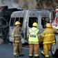 Firefighters and forensic medical personnel work at the scene of an accident between a tourist van and a cargo truck on the Lagos de Moreno highway in Zapotlanejo, Jalisco State, Mexico
