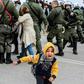 Police clashed with migrants protesting against tougher new asylum laws