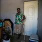 This file photo taken on December 30, 2019 shows Antonise Blan, 34, at home in the Haitian city of Croix des Bouquets; she lost her leg in the 2010 earthquake