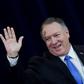 US Secretary of State Mike Pompeo waves after delivering remarks on human rights in Iran at the State Department