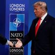 Arriving for the formal NATO talks on Wednesday, Boris Johnson denied he was trying to avoid being seen with Donald Trump