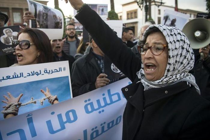 Moroccan human rights activists protest in the capital Rabat against what they say is a campaign of repression against social media users
