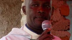 File image of murdered Catholic priest Michael Kyengo