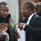 Nairobi Governor Mike Sonko, left, seen here in court in Nairobi on Monday, is known for his style mimicking an American rapper