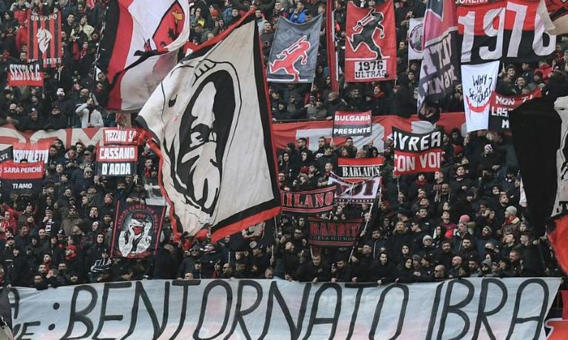 AC Milan fans display a banner reading "Welcome back Ibra" in the San Siro stadium in Milan.