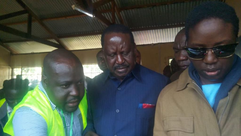 Raila Odinga accompanied by daughter Rosemary Odinga during Kibra by-election poll