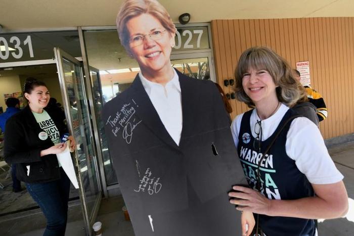 Democratic presidential hopeful Senator Elizabeth Warren, whose cardboard cutout proved a hit at her Las Vegas field office, claimed a fundraising bump after her standout debate performance ahead of Nevada's caucuses
