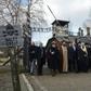 Muslim World League head  Mohammad bin Abdulkarim Al-Issa and American Jewish Committee leader David Harris among those at the infamous gates of the former Nazi German death camp Auschwitz