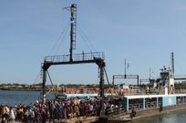 Police retrieve dead body that floated to the shore at the Likoni crossing in Mombasa