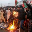 Pakistan Shiite Muslims burn an effigy of US President Donald Trump during a protest against the US strike that killed Iranian commander Qasem Soleimani