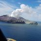 This handout photo taken on December 9, 2019 and released by the Auckland Rescue Helicopter Trust shows the view as a helicopter heads toward the smoldering White Island volcano off the coast of New Zealand's North Island