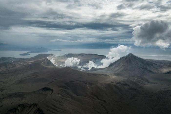 When Taal exploded to life it spewed towering columns of fine grey ash