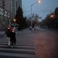 People in Beijing are donning masks and spraying antiseptic in a battle to halt the spread of the viral outbreak