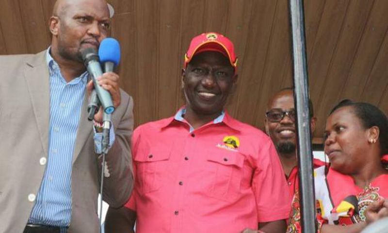 File image of Gatundu South MP Moses Kuria (left) and DP William Rutoat a past event. He has alleged that Majority whipBenjamin Washiali is missing