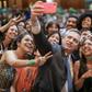 Then president-elect Alberto Fernandez poses for a selfie with women abortion campaigners in Buenos Aires in November 2019